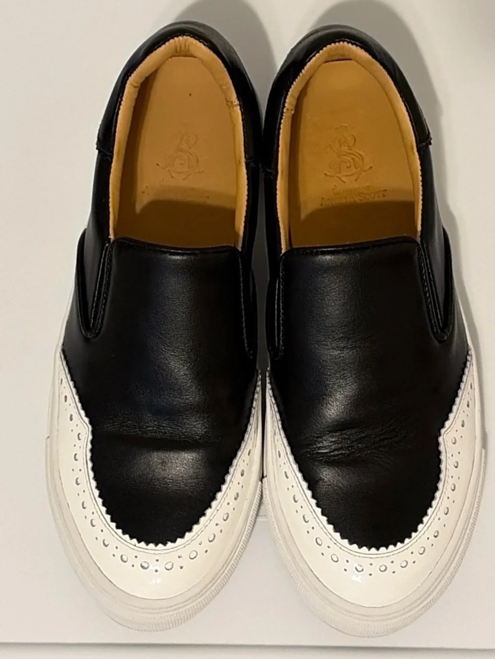 Black and White Slip-On Wingtip Sneakers for Women